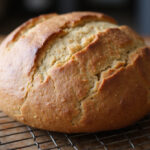 Delicious homemade Spelt Bread cooling and ready to be enjoyed.