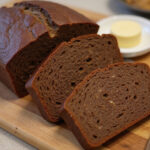 Finished Pan De Centeno loaf, perfect for sandwiches and enjoying the ultimate rye bread experience.