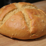 Delicious freshly baked Pan De Espelta (Spelt Bread) ready to be sliced and served.