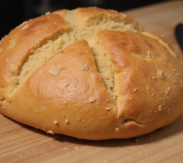 Delicious freshly baked Pan De Espelta (Spelt Bread) ready to be sliced and served.