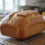Finished loaf of Pan Integral cooling on a rack.