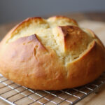 Delicious homemade Pan Sin Gluten, perfect for gluten-free diets, cooling on a rack.