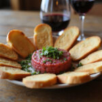 Finished fuet tartar with toast points, ready to eat. A delicious snack.