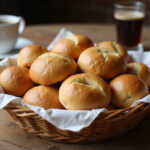 Freshly baked Pan De Bono in a basket, ready to eat.