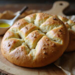 Freshly baked Pan De Cristal with large air pockets and crispy crust.