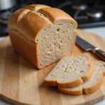 Freshly baked modern whole wheat bread, sliced and ready to eat.