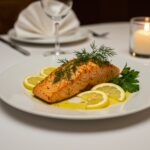 Pescado sazonado perfectamente presentado en un plato, ideal para disfrutar de cómo sazonar pescado.