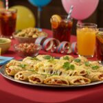 Plato acabado de Fiesta de Comida 'Juego de Gemelas', ideal para celebraciones llenas de diversión y nostalgia.