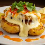 Papas rellenas con queso y espinaca acabadas, perfectas para disfrutar en cualquier ocasión.