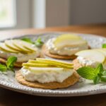 Finished tostadas con pera y requesón elegantly presented for a light and sophisticated appetizer.