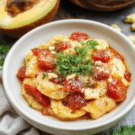 Plated pasta de tomate y calabacín ready to enjoy, perfect for a delicious meal.